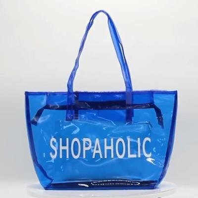 China Wholesale Custom Logo Fashion Women's Handled PVC Tote Bag Beach Handbag Clear Transparent Zipper Zipper Closed PVC Shopping Bag for sale