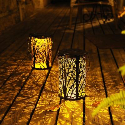 China Theme Park Hollow Out Leaf Projection Solar Lamp Hand Lamp Lawn Yard Decoration LED Lamp for sale