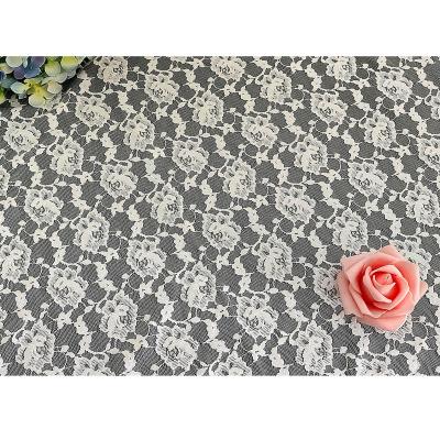 China White flower lace fabric nylon and spandex elastic high quality fancy knitting lace for dress for sale