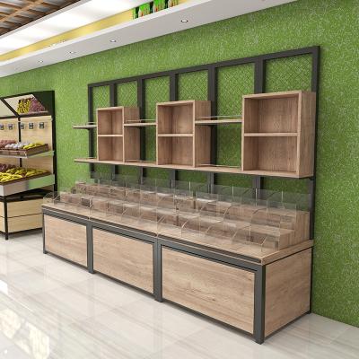 China Customized wooden double sided candy display rack goods display rack for candy supermarket storge rack for sale