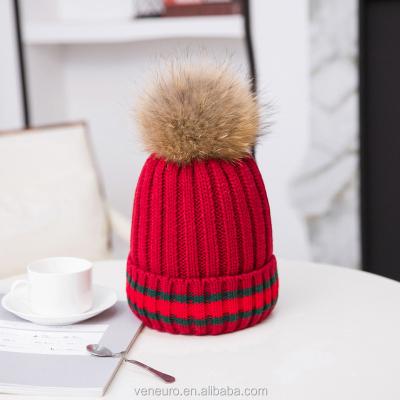 China COMMON large raccoon fur ball knitted wool hat women and children knit beanie hat winter pom poms hats for sale