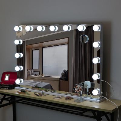 China Luxury High Quality Standing Lighted Hollywood Vanity Makeup Mirror Large Size Living Room Desk Mirror With LED Bulbs for sale