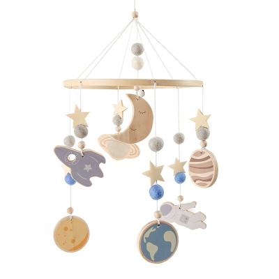 China Musical Kids Room Decor Baby Shower Gift Kids Hanging Wooden Crib Rocket Astronaut Baby Crib Mobile Handmade Toys Planet Moon Star for sale