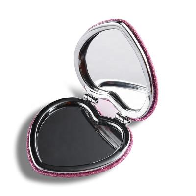 China Pink Heart Shaped Double Sided Travel Mirror , Glitter Plastic Compact Mirror for sale