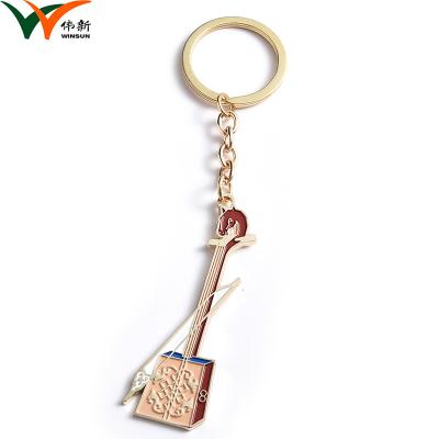 China Violin Shape Promotional Key Rings With Multi Color Customized Size for sale