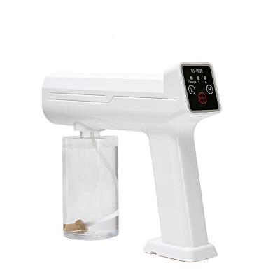 China Electric Blue Nano Cordless Vapor Light Atomizer Disinfection Alcohol Machine Moisturizer Sprayer Nano Spray Gun for sale