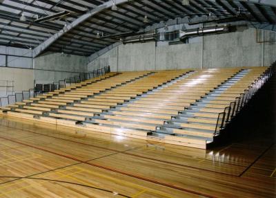 China Natural Timber Retractable Bleacher Seating Customized Row Depth For Indoor for sale