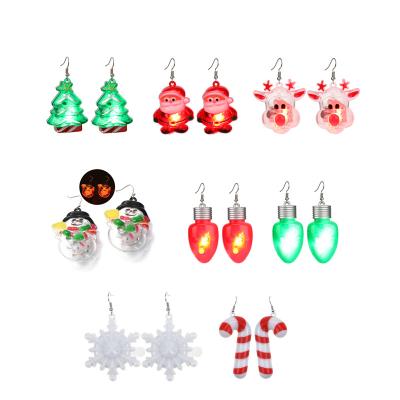 China Trendy Christmas Party Earrings LED Lights Snowman Santa Claus Luminous Earrings Christmas Tree Elk Earrings for sale