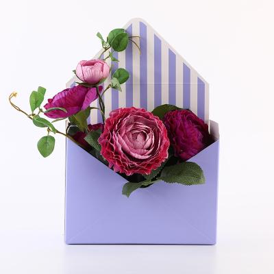 China Handmade Valentine Luxury Creative Folding Rose Flower Packaging Gift Box With Envelope Shape for sale