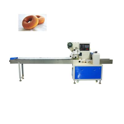 China Automatic Flow Package Donut Packing Machine Dessert Bread Food Donuts Pillow Horizontal Packaging Machine for sale