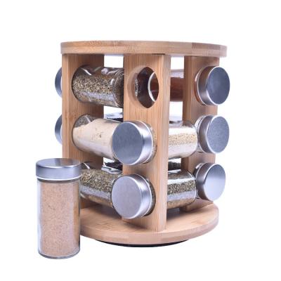 China Stocked 12 Holes Rotating Condiment Set Condiment Bamboo Spice Storage Pepper Bottles Salt Pot Kitchen Accessories for sale