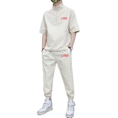 China Wholesale QUICK DRY custom logo men's tracksuit autumn OEM fashion white high quality set tracksuits for men for sale