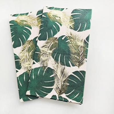 China Printed Green Leaves Hot Stamping 3Ply 1/6 Fold Disposable Paper Print Guest Napkin Cocktail Napkin Christmas Decorative Dinner Napkin for sale