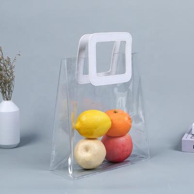 China Fashion RTS Heavy Duty Plastic Gift Bags Transparent Bulk Shopping Tote Bag Clear PVC Gift Bags With Handles for sale