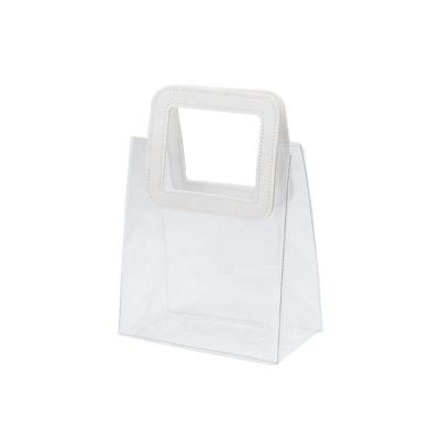 China Custom Heavy Duty Plastic Gift Handled Bags Transparent Bulk Shopping PVC Tote Bag Clear Gift Bags With Handles for sale