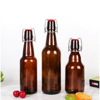 China 500ml 330ml Home Brewing Beverage Airtight Rubber Seal Glass 16 Ounce Empty Amber Clear Glass Swing Top Beer Bottle With Wire Easy Swing Cap for sale