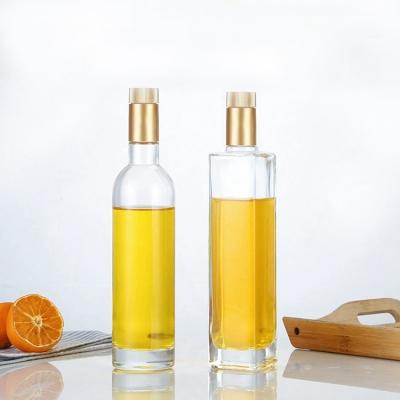 China Wholesale Customized Good Quality Popular Product Food Olive Oil Glass Bottle With Lid For Kitchen for sale