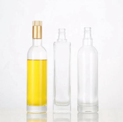 China Miscellaneous Food Promotional Goods Using Popular Product Empty Round And Square Olive Oil Bottle for sale