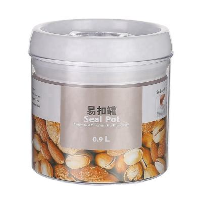 China Stored Safe Plastic Round Food Storage Box 900ml Airtight Food Container With Lid for sale