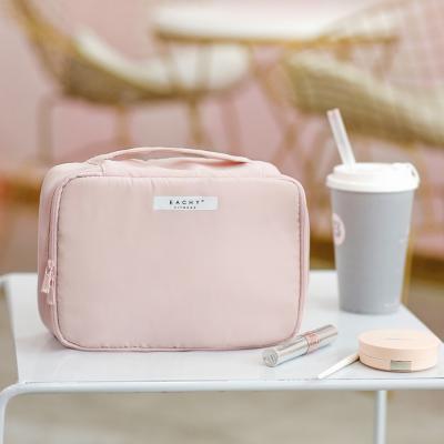 China New Girls Fashion Logo Large-Capacity Portable Pink Duffle Cosmetic Bag Wash Duffle Bag Custom Travel Storage Cosmetic Bag for sale