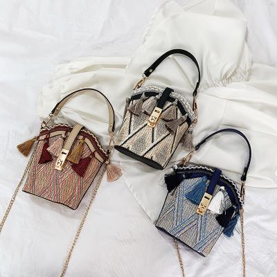 China Fashion Fashion Rattan With Tassel For Women Vintage Purses Shoulder Woven Bucket Bags Women Handbag 2021 for sale