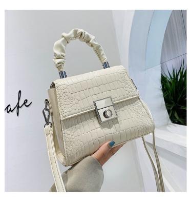 China Latest square cross lock\fasion fashion women's small handbag bags - body stone pattern women's handbags with handle for sale