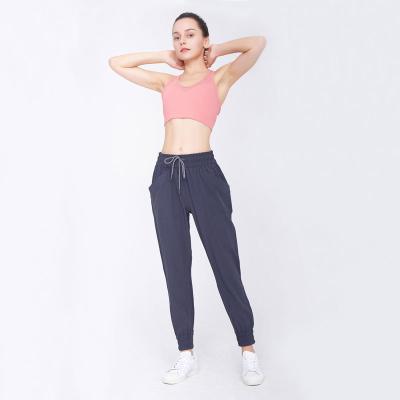 China Breathable Quick-Drying Large Size Loose Yoga Pants Women Sports Pants Running Fitness for sale