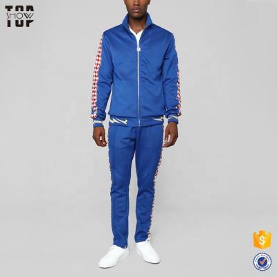 China 100% Polyester QUICK DRY QUICK DRY Mens Sport Bolt Blue Tracksuit With Bolt Design for sale