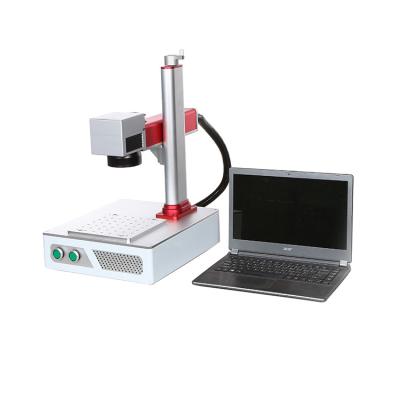 China Air-cooled Portable Desktop Laser Engraver 20W 30W 50W Fiber Laser Marking Machine For Metal Engraving for sale