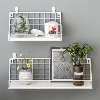 China Nordic Creative Simple Wall Shelf Living Room Wall Decoration Bedroom Dining Room Storage Rack Without Hole Eco-friendly for sale