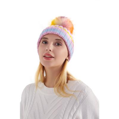 China Fashion COMMON Winter Colorful Merino Wool Women Knit Hat Beanie With Fur Pompom for sale