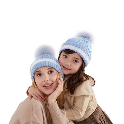 China COMMON Wool Knitted Mommy and Baby Winter Flip Hat Beanies with Pom Pom Custom for sale