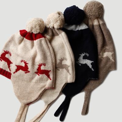 China COMMON winter knitted kids cashmere fawn jacquard girls woolen warm hat with strings and earflap for sale