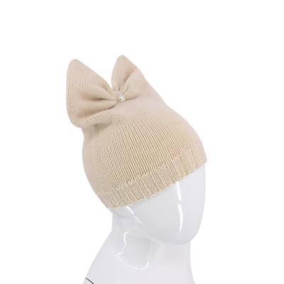 China COMMON Beige Bow Beanies Fashion Lovely Winter Hat For Kids Stylish Hats for sale