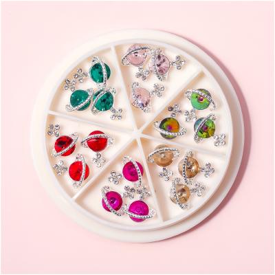 China Newly Launched Zinc Alloy A Variety Of Boxed Nail Styles Saturn Charm Accessories For Women Press On Nails With Rhinestones for sale