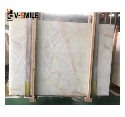 China Modern natural translucent onyx backlit marble slabs for wall and floor for sale