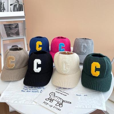 China Kpop JOINT C Letter Patch Knitted Hat Autumn And Winter Student Empty Top Baseball Woolen Hat Peaks Hearing Protection Warm Fashion for sale