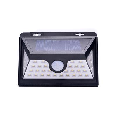 China Super Bright Waterproof Outdoor Motion Sensor Solar Powered Yard 36 SMD PIR LED Garden LANDSCAPE Wall Security Light for sale