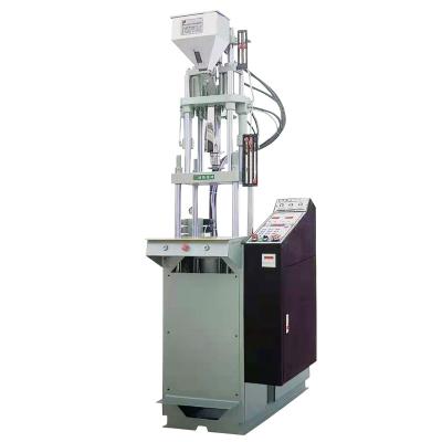 China Pressed Plastic Injection Moulding Machine Ballpoint Pen Vertical Injection for sale