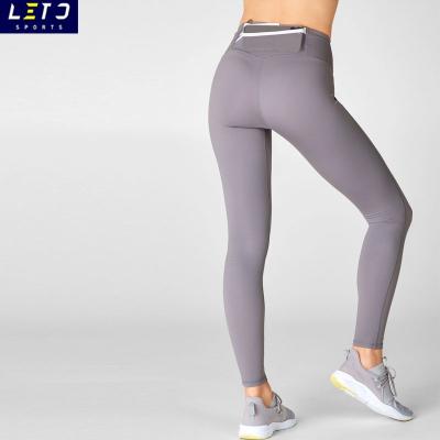 China Antibacterial Tik tok leggings butt lift yoga gym mesh waist pocket back leggings yoga pants for sale