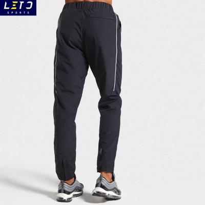 China Custom logo wind proof men's quick dry pants and pants pocket sweatpants sports track pants for sale