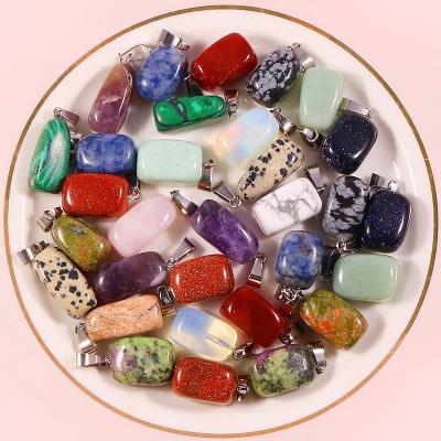 China FASHIONABLE Wholesale Custom Charms Handmade Irregular Natural Healing Crystal Stone Pendant For Jewelry Making for sale