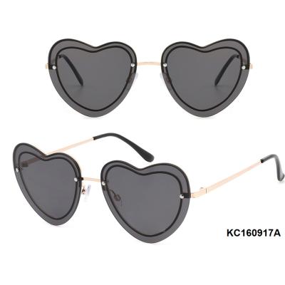 China Custom Polarized Rimless Lenses Fashion Love Heart Shape Sunglasses Women Metal Rimless Temple Outdoor Safety Protection For Ladies for sale