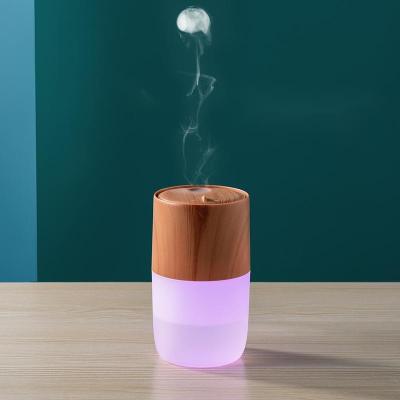 China New Design 300ML Car Perfume Colorful Lights Mini USB Rechargeable Cool Mist Ring Jellyfish Car Humidifier for sale