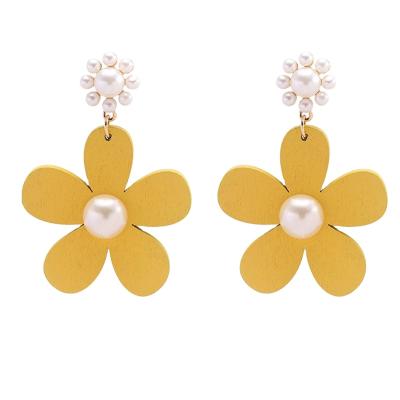 China FASHIONABLE Korean Women Piercing Jewelry Wooden Design Yellow Flower Bead Earrings for sale