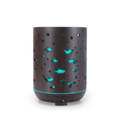 China Wooden Chinese Customizable Animal Hollow Grain Humidifier 300ml Electric Incense Humidifier for sale