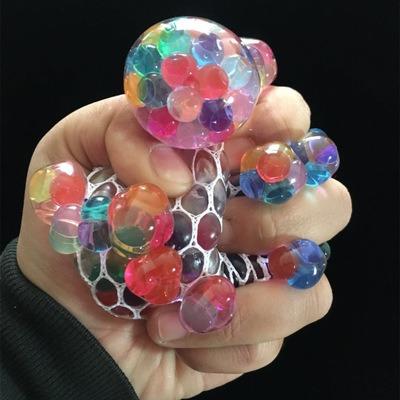 China Stress Relax Hot Sales Stress Reliever Hand Wrist Squishy Toy Soft Colorful Mesh Squishy Grape Squeeze Ball for sale