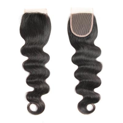 China Curly Silky Unprocessed Virgin Hair Brazilian Body Wave Cuticle Aligned Human Hair 4x4 Lace Closure for sale