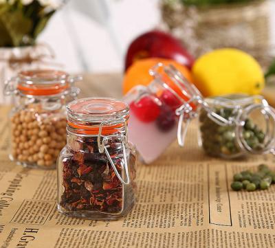 China Small Heatable Glass Jar With Clip Top Lid , 50ml Glass Spice Jar With Metal Closure for sale