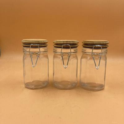 China 10oz heatable glass jar with clip top lid, 250ml glass spice jar with bamboo lid and clip top lid, for sale